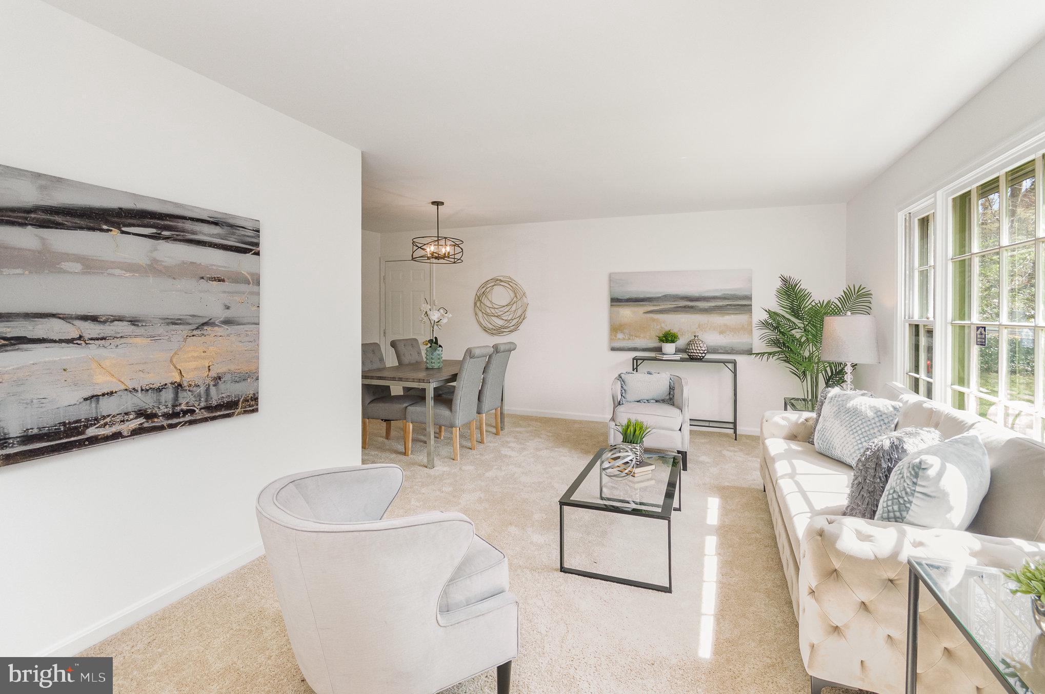 7715 Fort Hunt Road Alexandria, VA 22308 - Photo 4 of 21 a living room with furniture and a large window