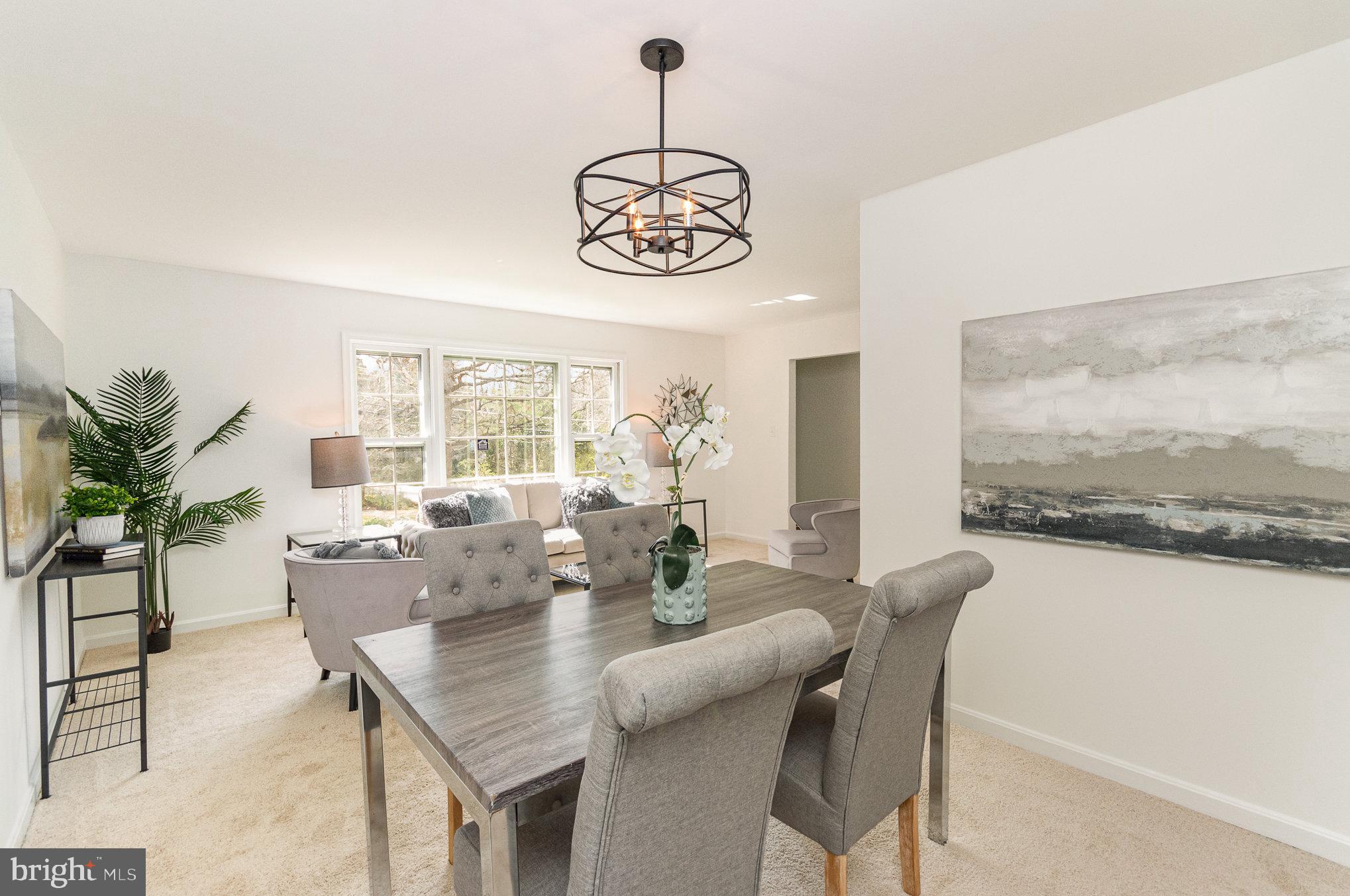 7715 Fort Hunt Road Alexandria, VA 22308 - Photo 6 of 21 a view of a dining room with furniture window and outside view