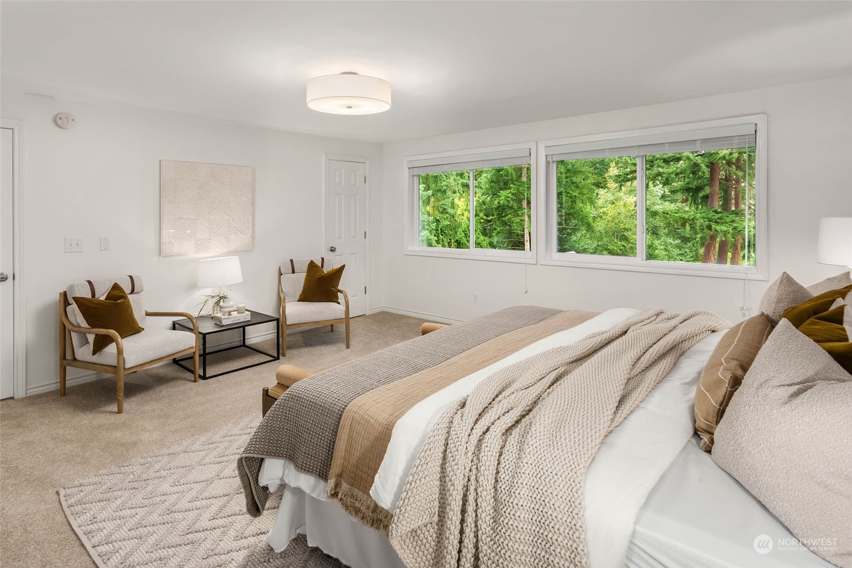 18604 29th Avenue Southeast Bothell, WA 98012 - Photo 12 of 40 a bed room with a bed and a couch