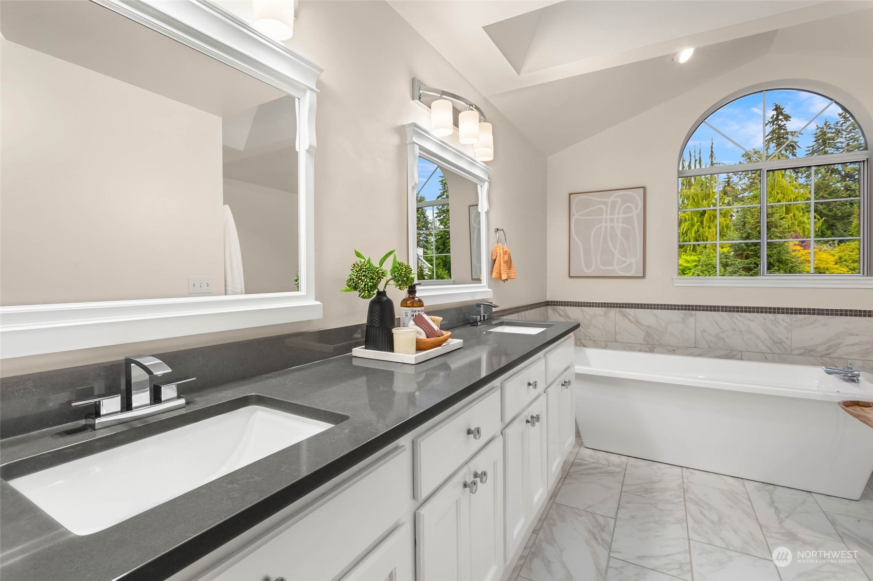 18604 29th Avenue Southeast Bothell, WA 98012 - Photo 14 of 40 a bathroom with a sink and a large mirror