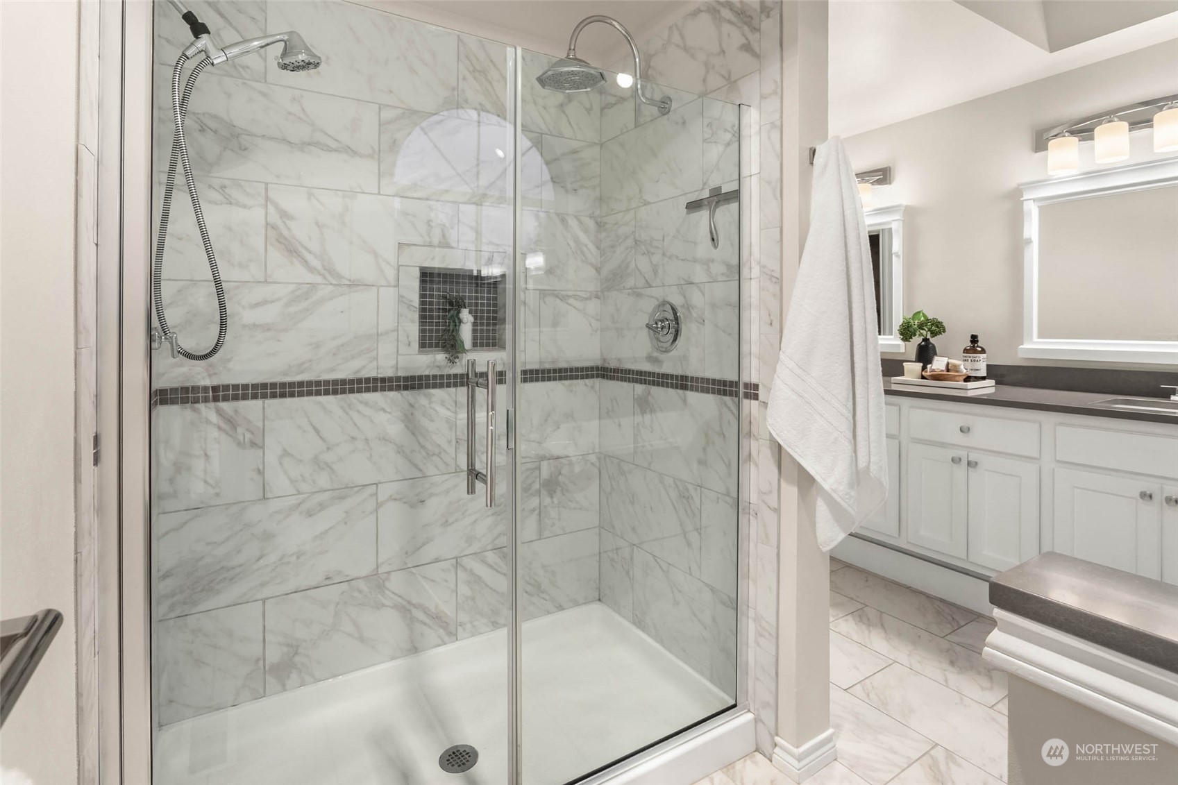 18604 29th Avenue Southeast Bothell, WA 98012 - Photo 16 of 40 a bathroom with a shower and a sink