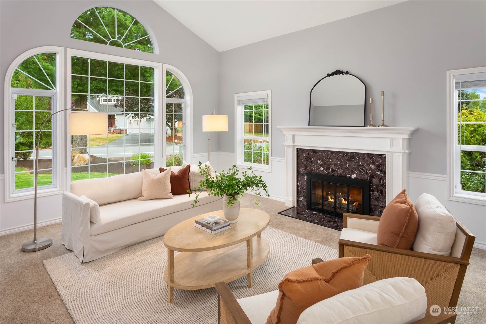 18604 29th Avenue Southeast Bothell, WA 98012 - Photo 20 of 40 a living room with furniture and a fireplace