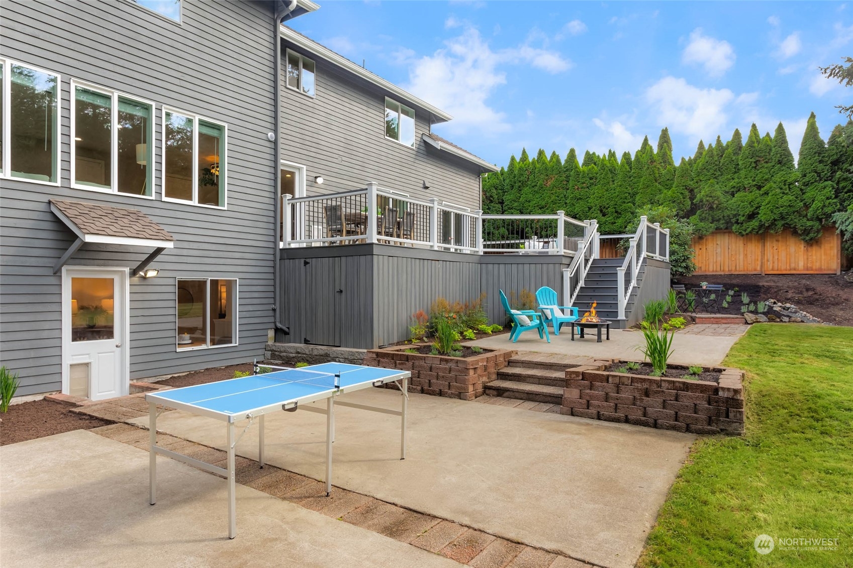 18604 29th Avenue Southeast Bothell, WA 98012 - Photo 36 of 40 a view of a house with backyard and sitting area