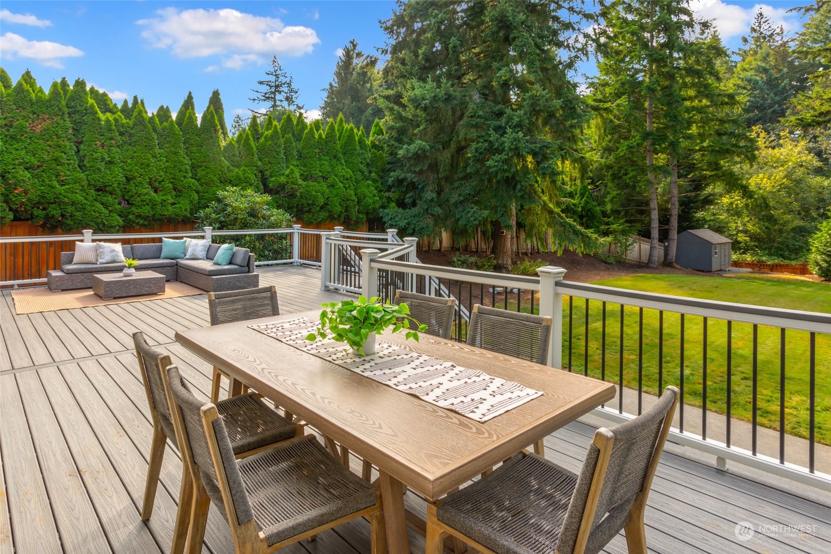 18604 29th Avenue Southeast Bothell, WA 98012 - Photo 8 of 40 a view of a patio with a table chairs and a table