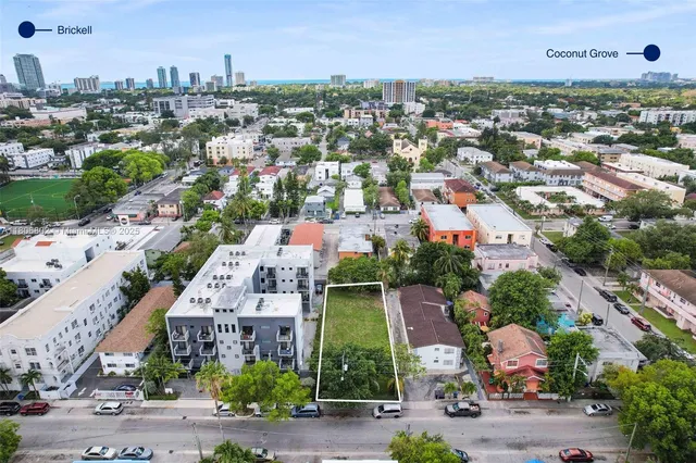 an aerial view of a city with lots of residential buildings