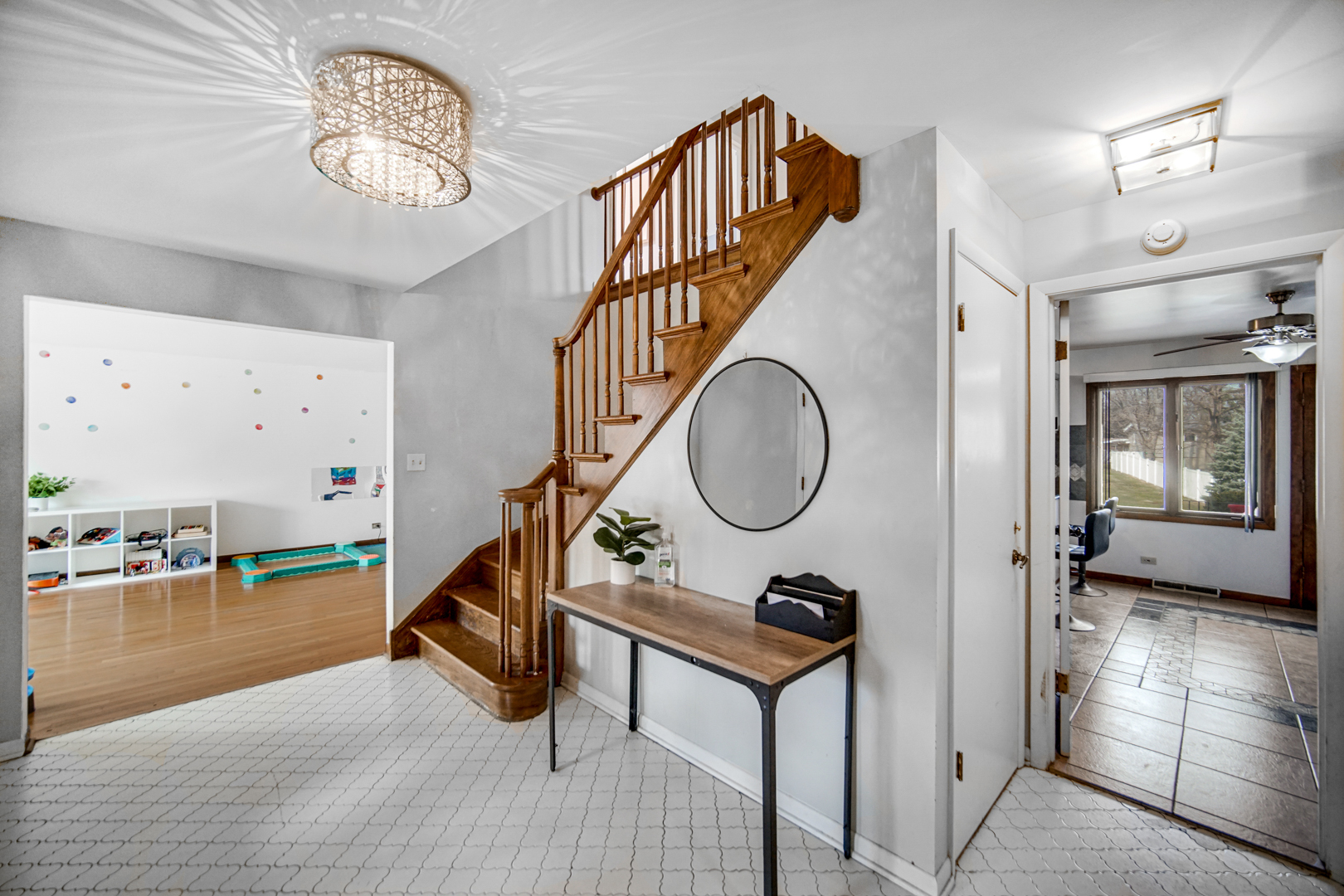 2945 Bob O Link Road Flossmoor, IL 60422 - Photo 5 of 24 a view of a hallway with wooden floor and furniture
