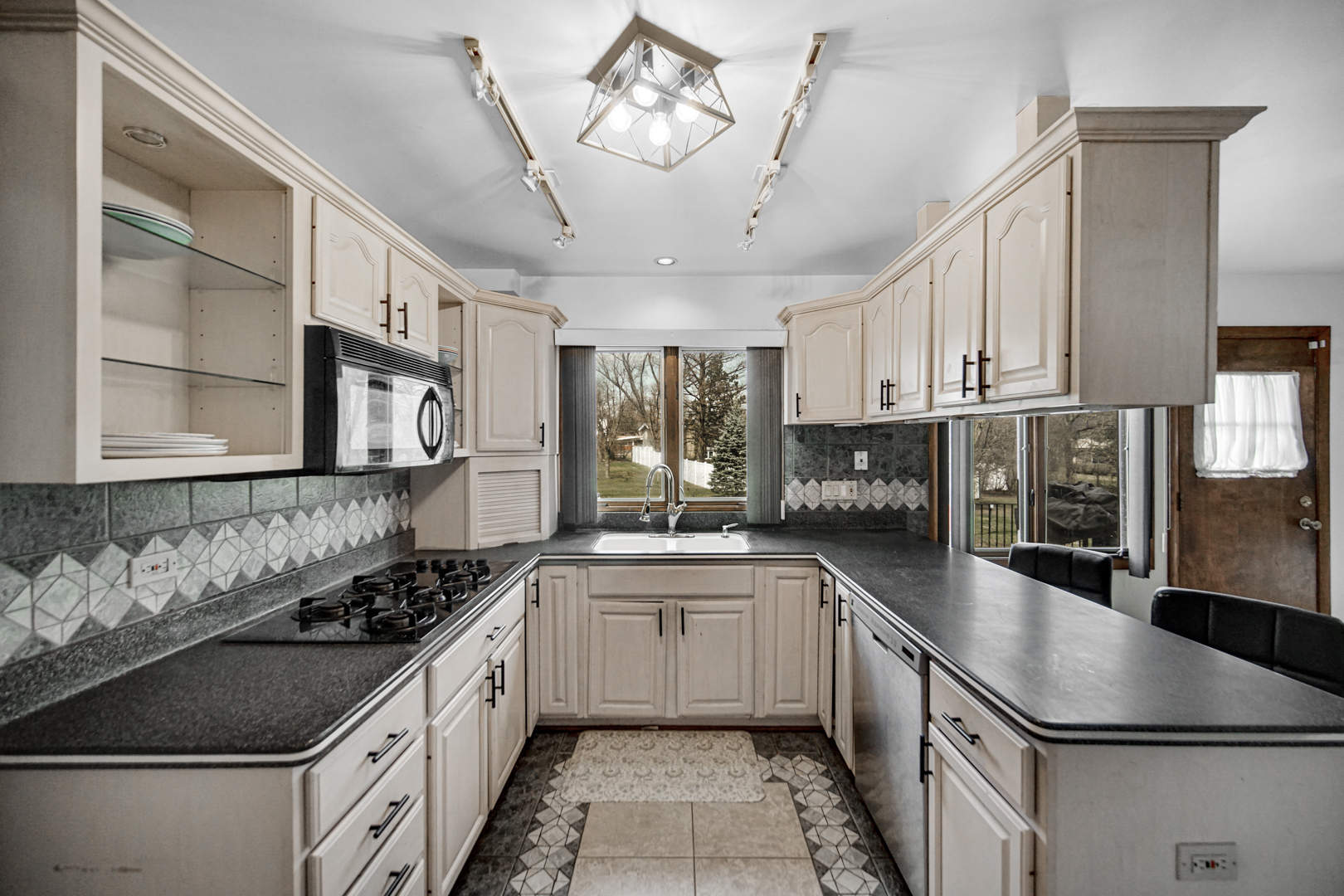 2945 Bob O Link Road Flossmoor, IL 60422 - Photo 9 of 24 a kitchen with stainless steel appliances granite countertop a sink stove and cabinets