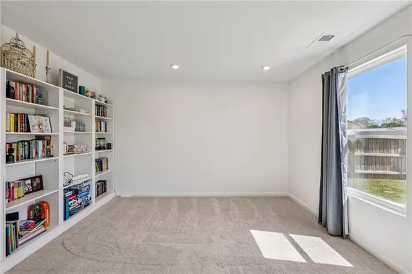 a view of room with shelves