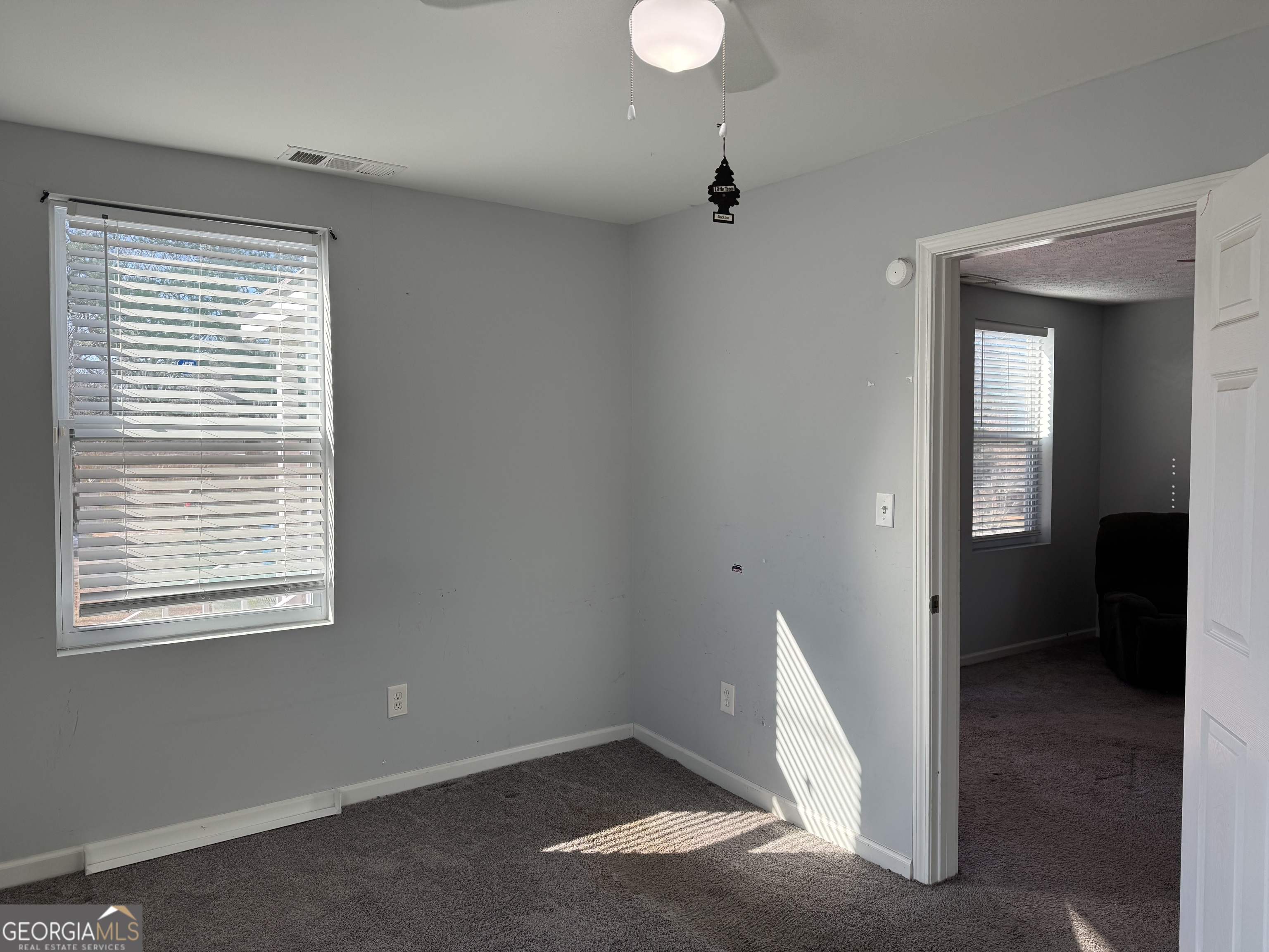 406 Shankle Road Commerce, GA 30529 - Photo 12 of 19 a view of an empty room with a window