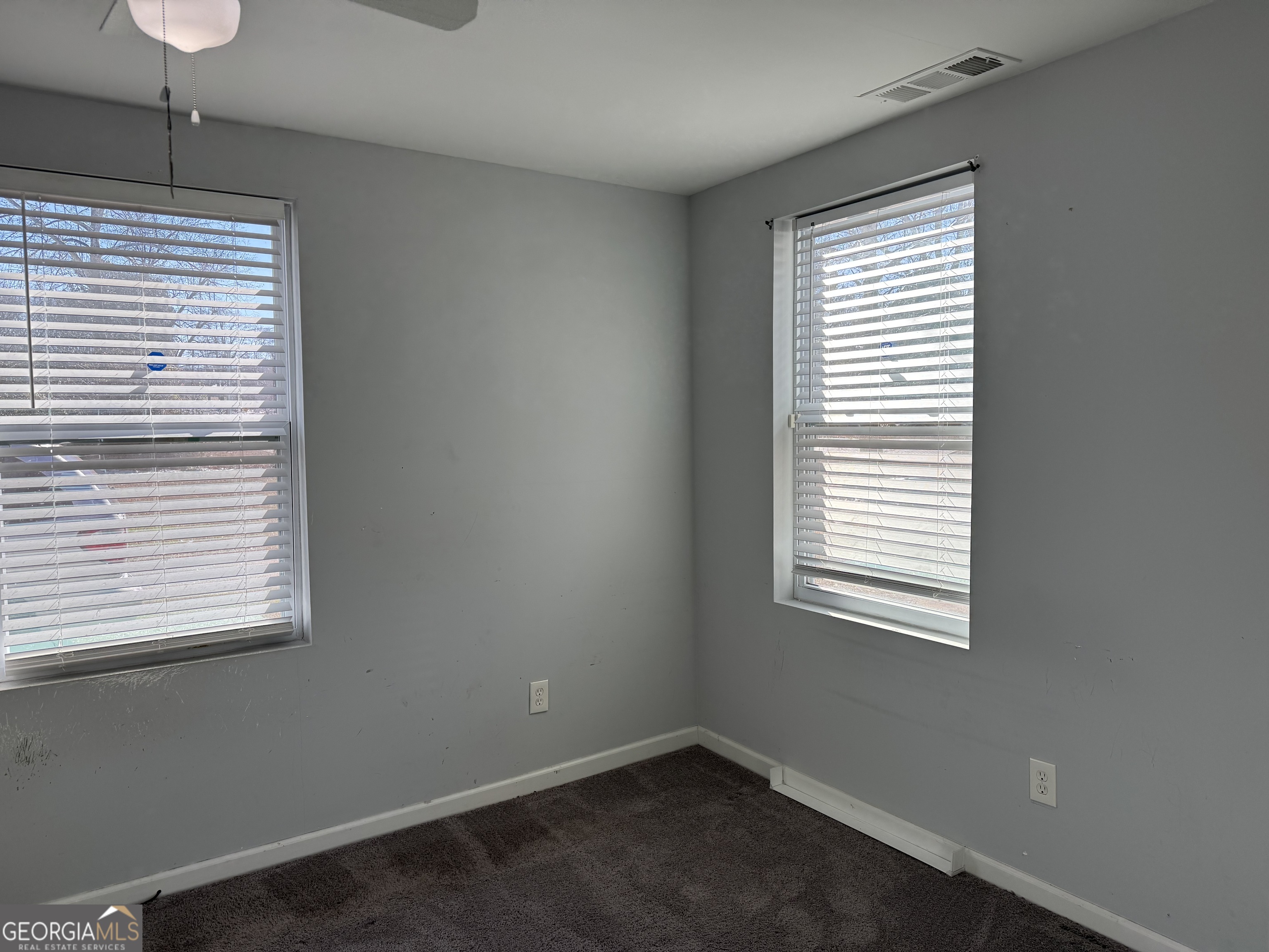 406 Shankle Road Commerce, GA 30529 - Photo 13 of 19 a view of an empty room with a window