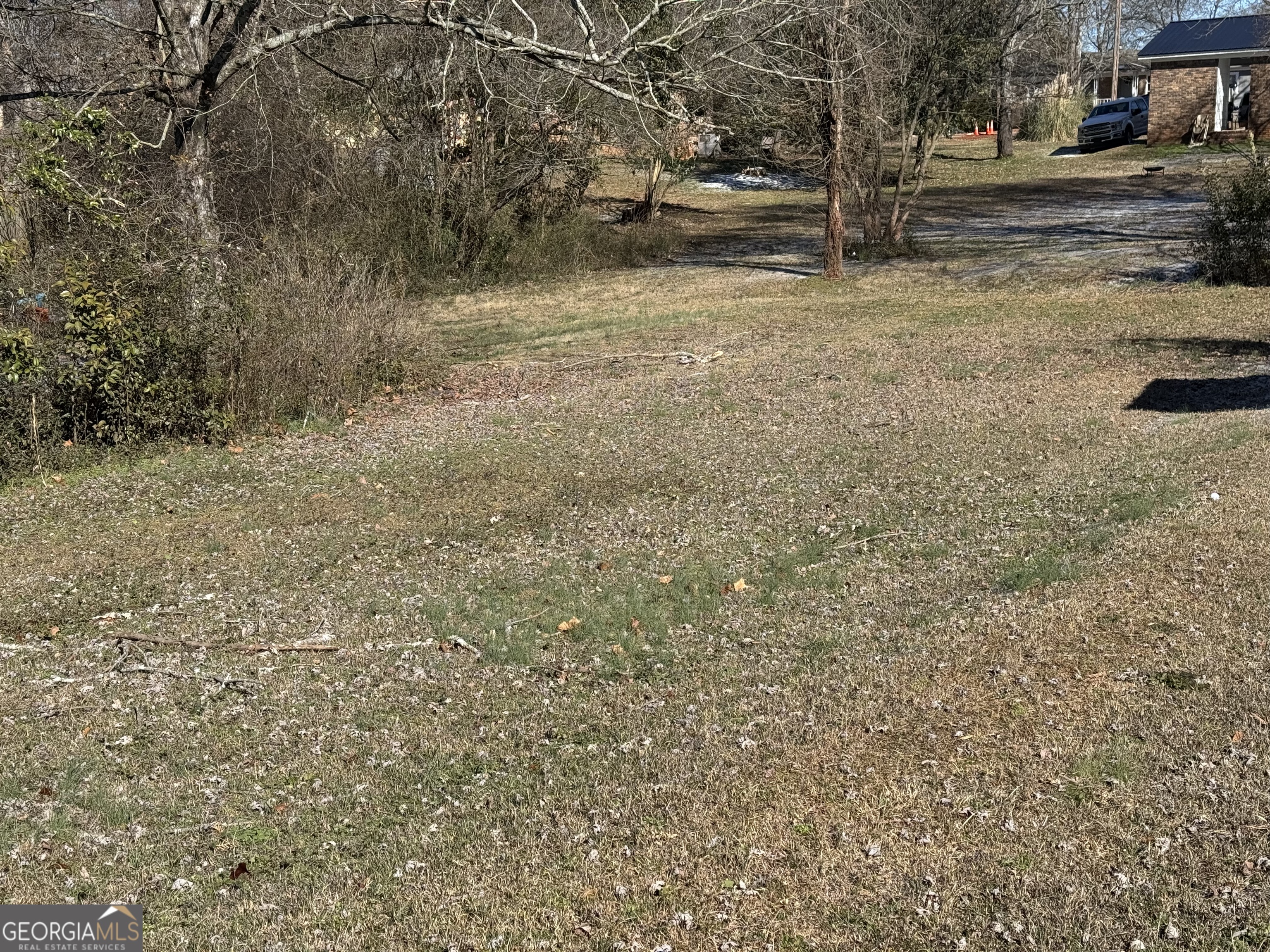 406 Shankle Road Commerce, GA 30529 - Photo 19 of 19 a view of road with large trees