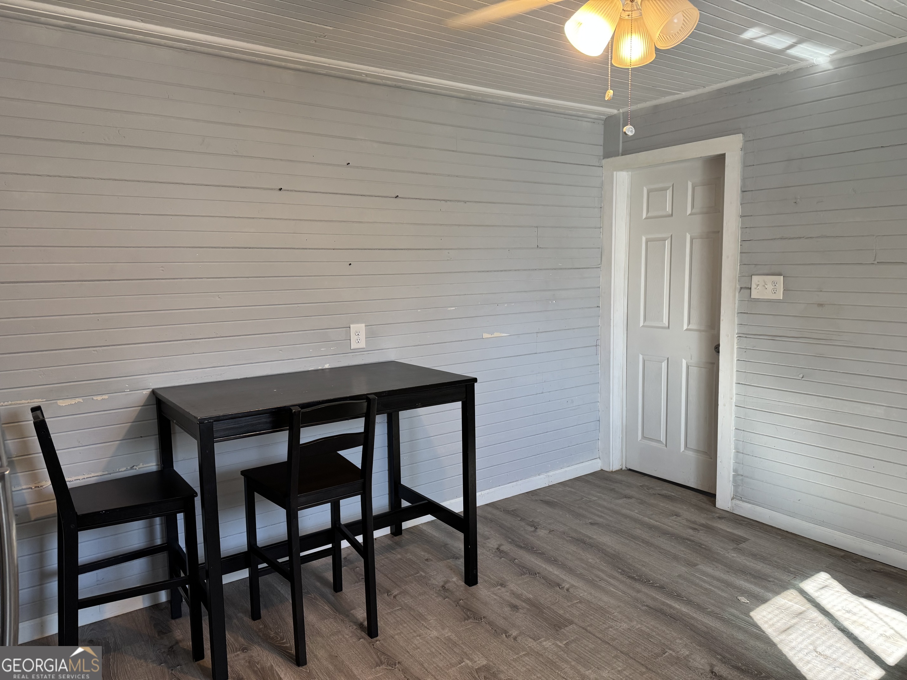 406 Shankle Road Commerce, GA 30529 - Photo 10 of 19 a view of a room with a table and chairs