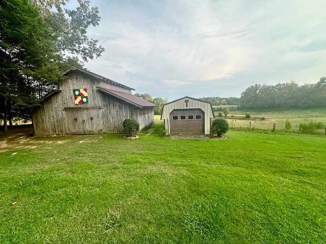 3586 River Road Baxter, TN 38544 - Photo 3 of 8 a house view with a garden space