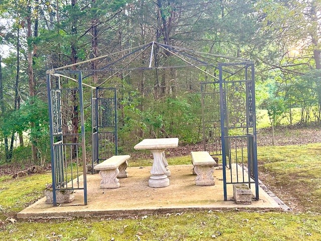 3586 River Road Baxter, TN 38544 - Photo 5 of 8 a view of a swimming pool with a patio