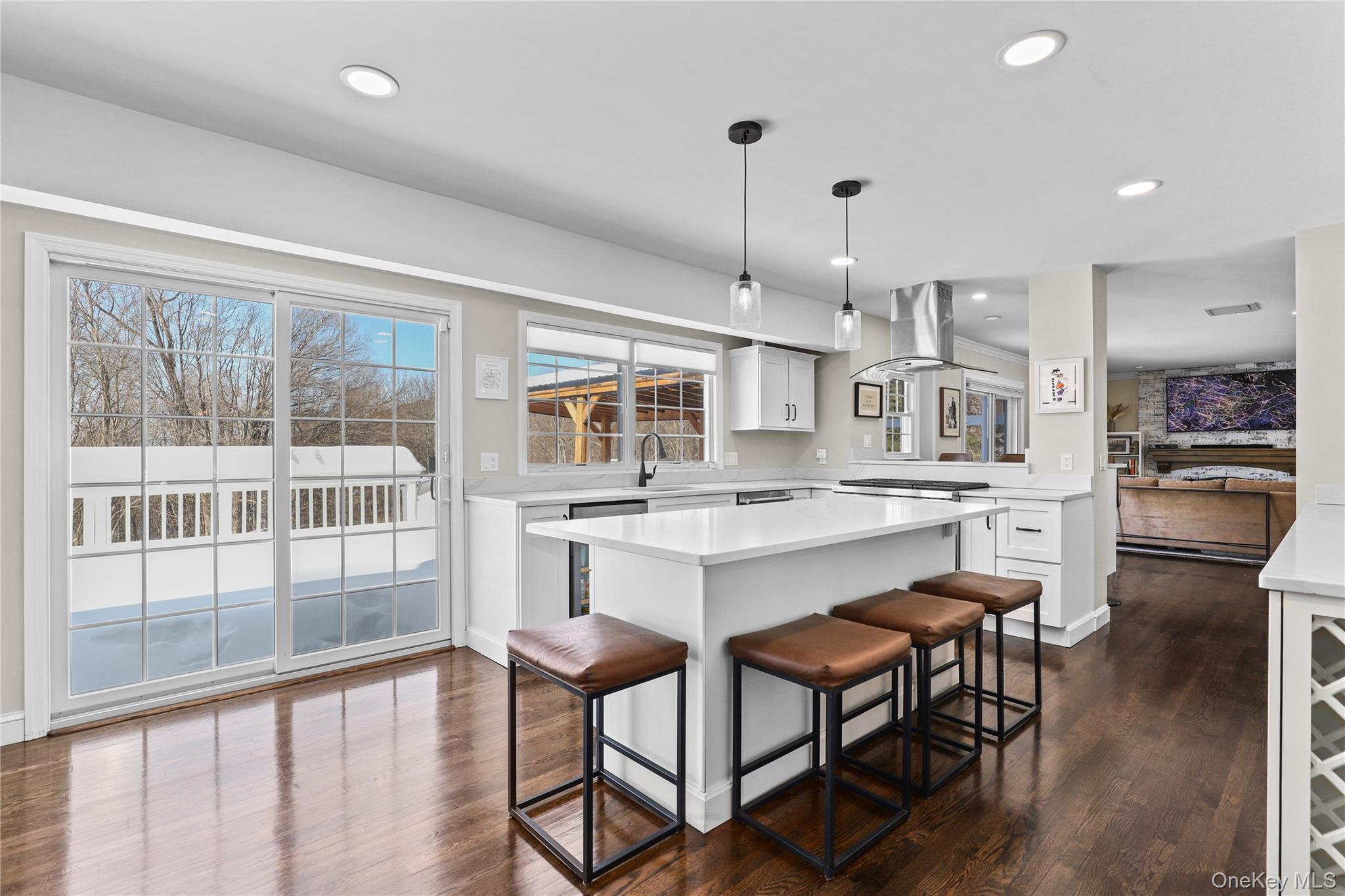 288 Todd Road Katonah, NY 10536 - Photo 9 of 32 New kitchen windows and sliding doors which lead to an expansive deck.