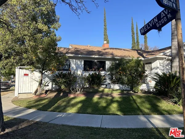 a front view of house with yard