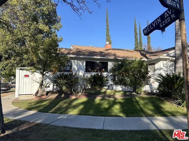 a front view of house with yard