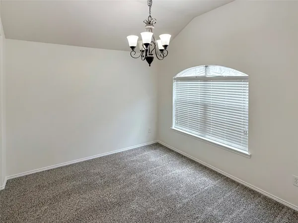 a view of a chandelier in big room