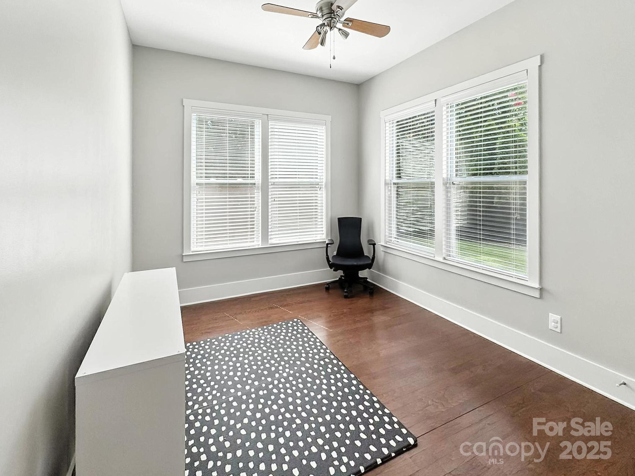 3076 Amaranth Drive Tega Cay, SC 29708 - Photo 15 of 39 a living room with a large window