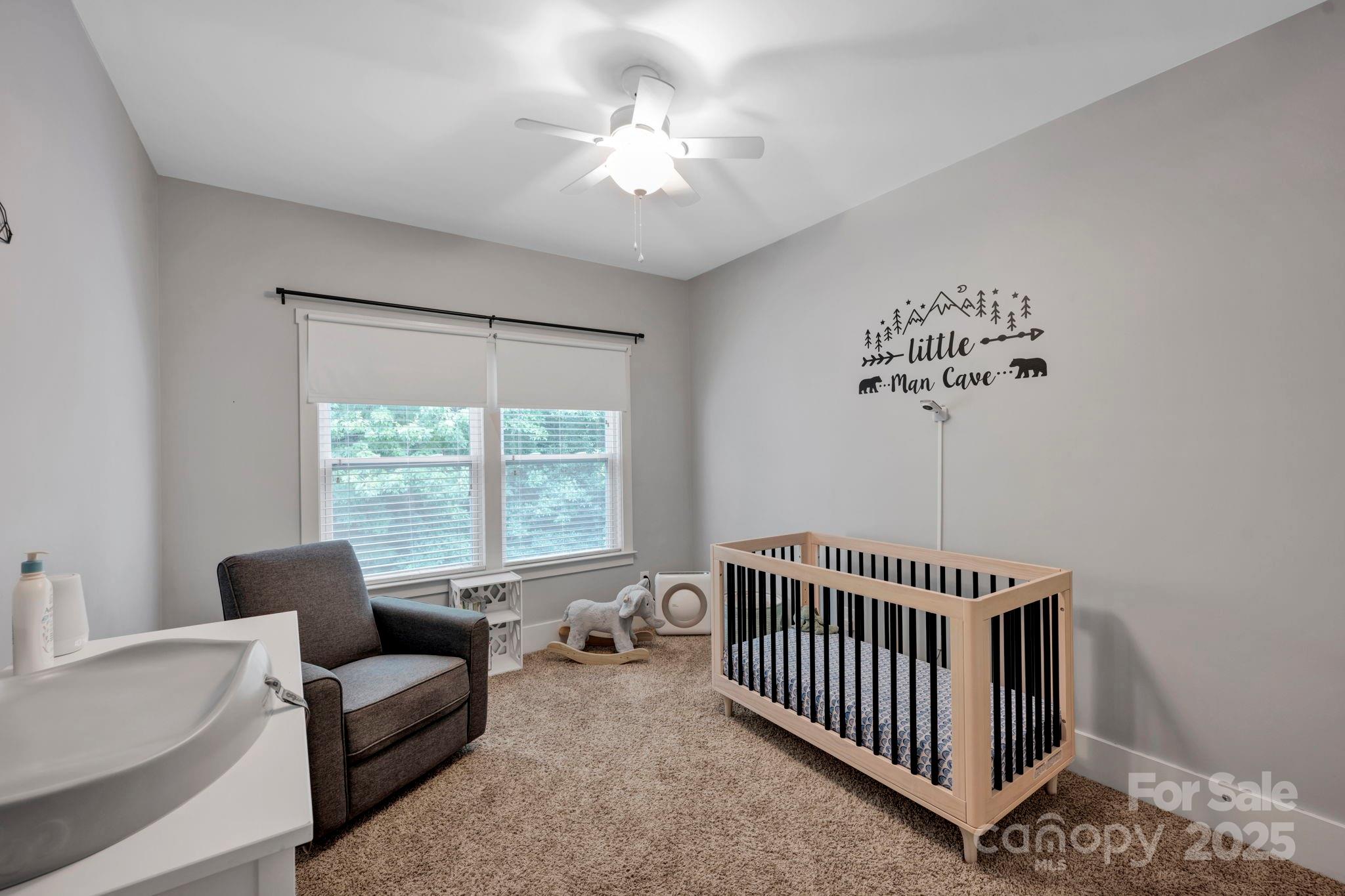 3076 Amaranth Drive Tega Cay, SC 29708 - Photo 29 of 39 a view of a livingroom with furniture and staircase