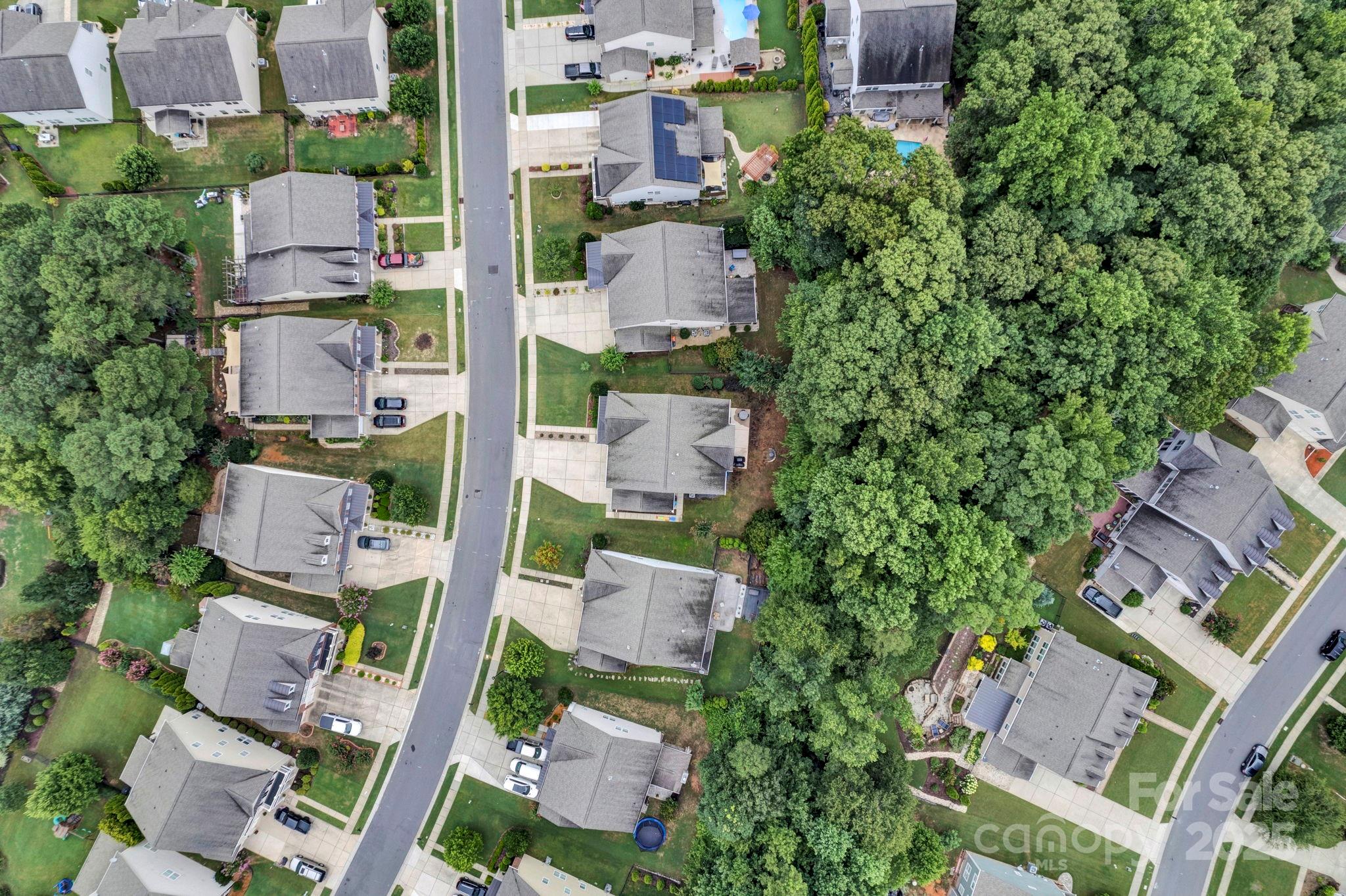 3076 Amaranth Drive Tega Cay, SC 29708 - Photo 33 of 39 an aerial view of residential houses with outdoor space and street view