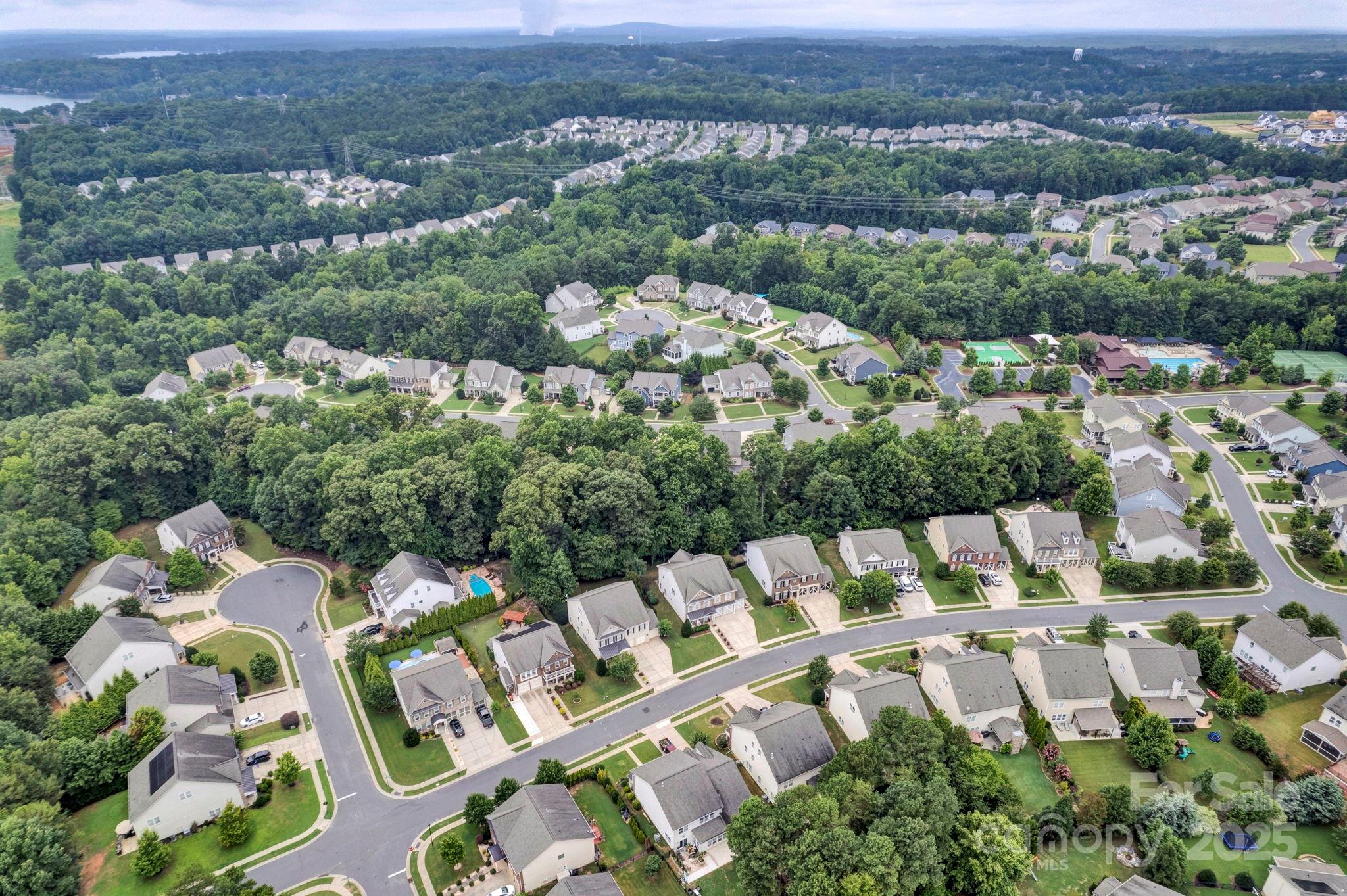 3076 Amaranth Drive Tega Cay, SC 29708 - Photo 34 of 39 an aerial view of a city with lots of residential buildings
