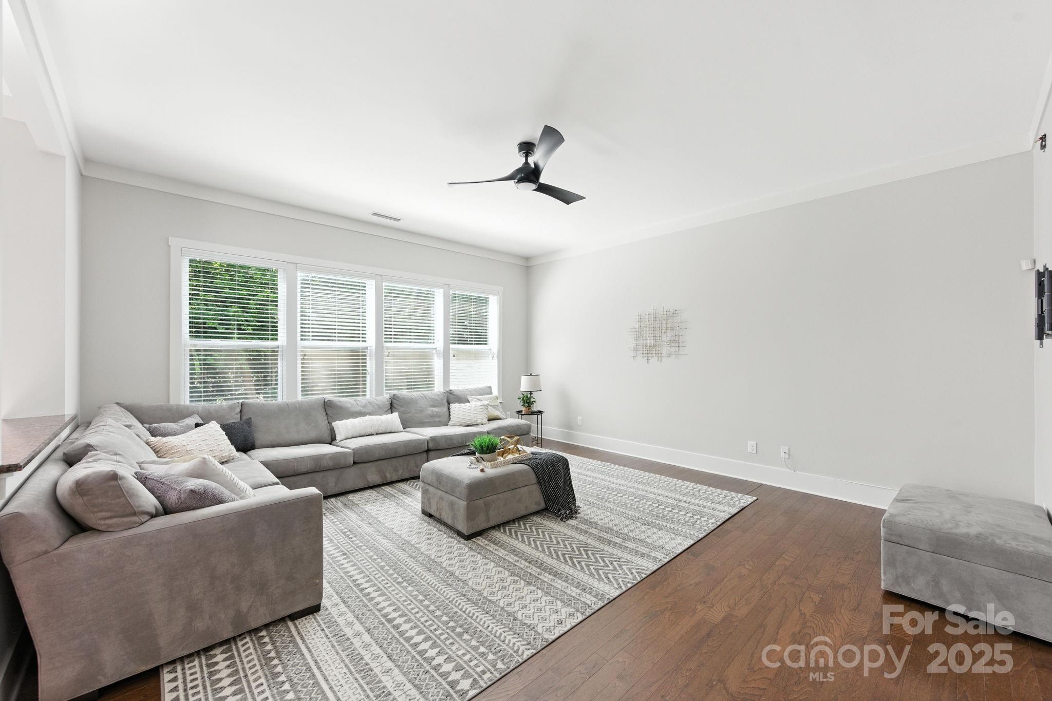 3076 Amaranth Drive Tega Cay, SC 29708 - Photo 6 of 39 a living room with furniture and a window