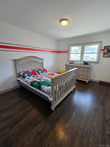 a room with toys and wooden floor