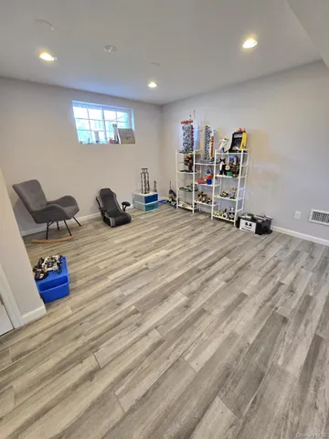 a room with gym equipment and a large window