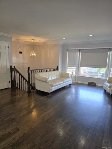 a view of livingroom with hardwood floor and window