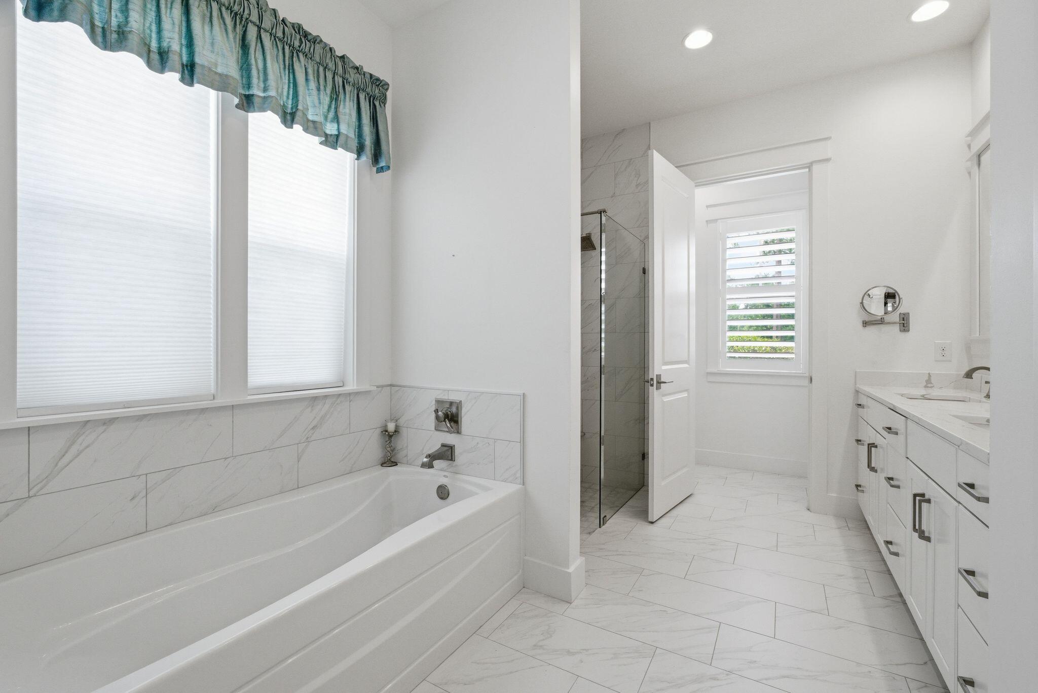 133 Sandchase Circle, Unit LOT 15 Inlet Beach, FL 32461 - Photo 15 of 47 a bathroom with a bathtub and a shower