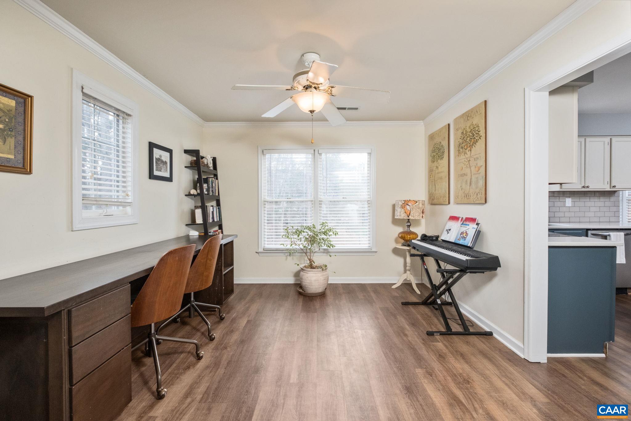 1143 Raintree Drive Charlottesville, VA 22901 - Photo 13 of 49 a living room with furniture two window and wooden floor
