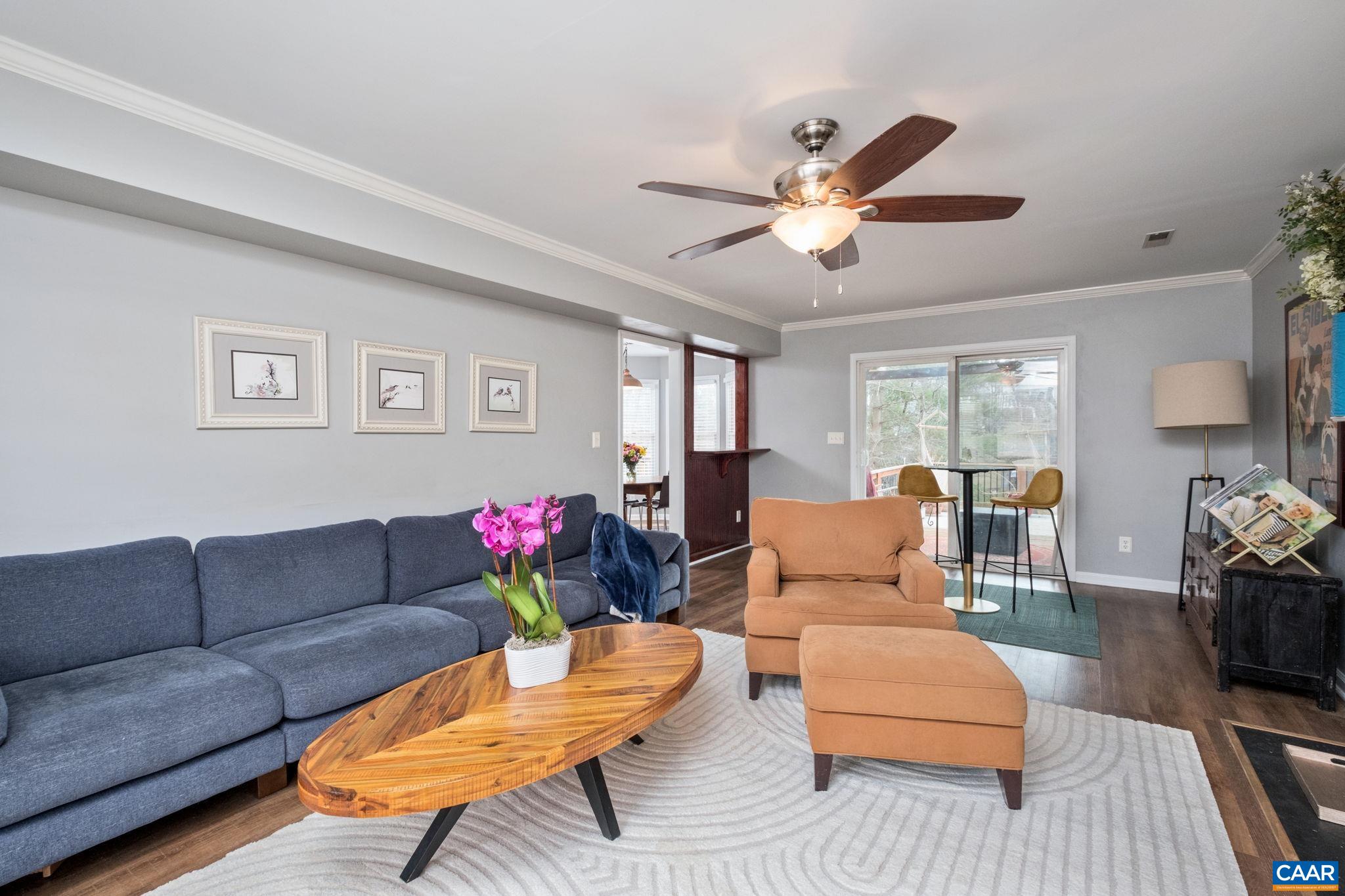 1143 Raintree Drive Charlottesville, VA 22901 - Photo 2 of 49 a living room with furniture fireplace and a window