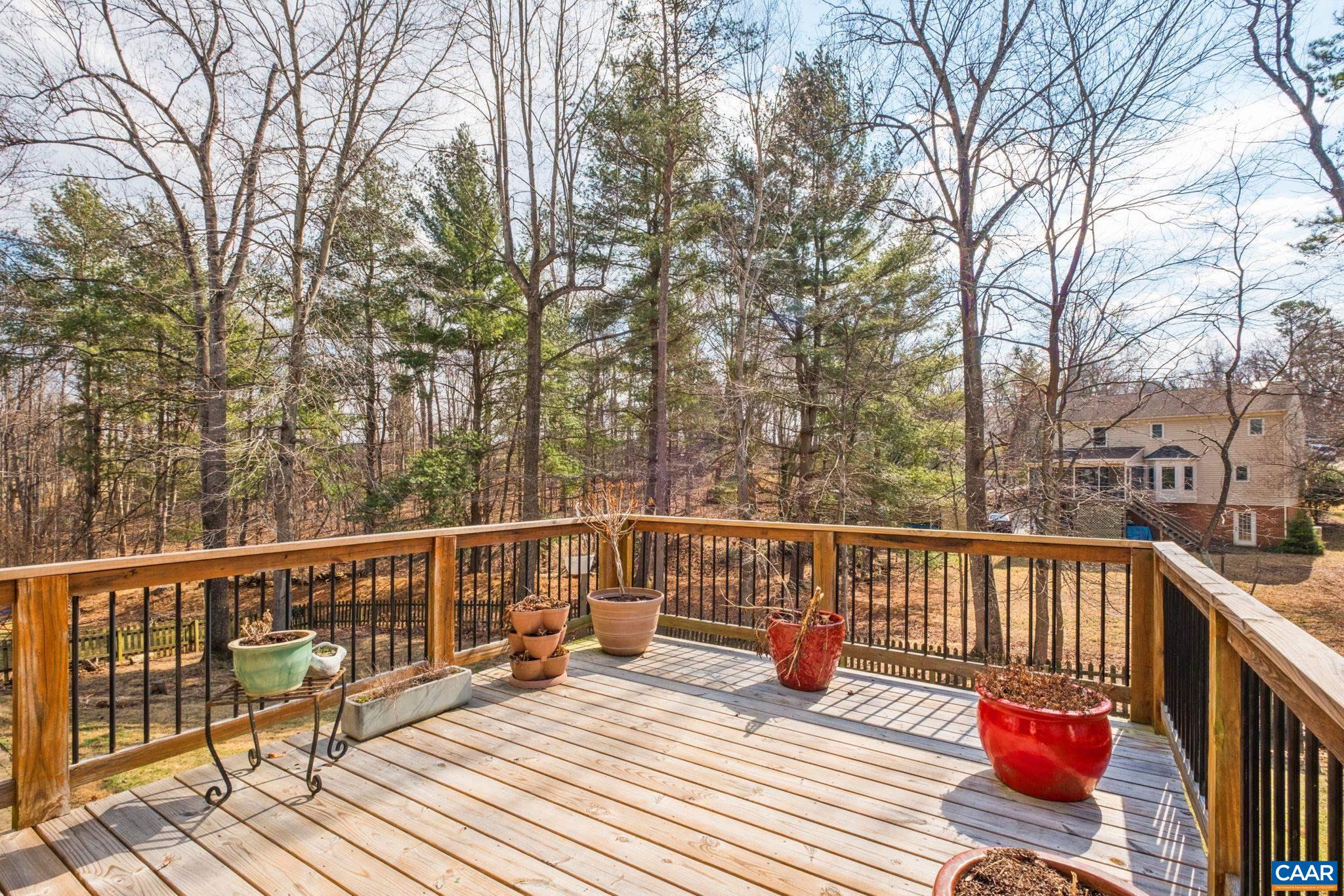 1143 Raintree Drive Charlottesville, VA 22901 - Photo 34 of 49 a view of a balcony with wooden floor and fence