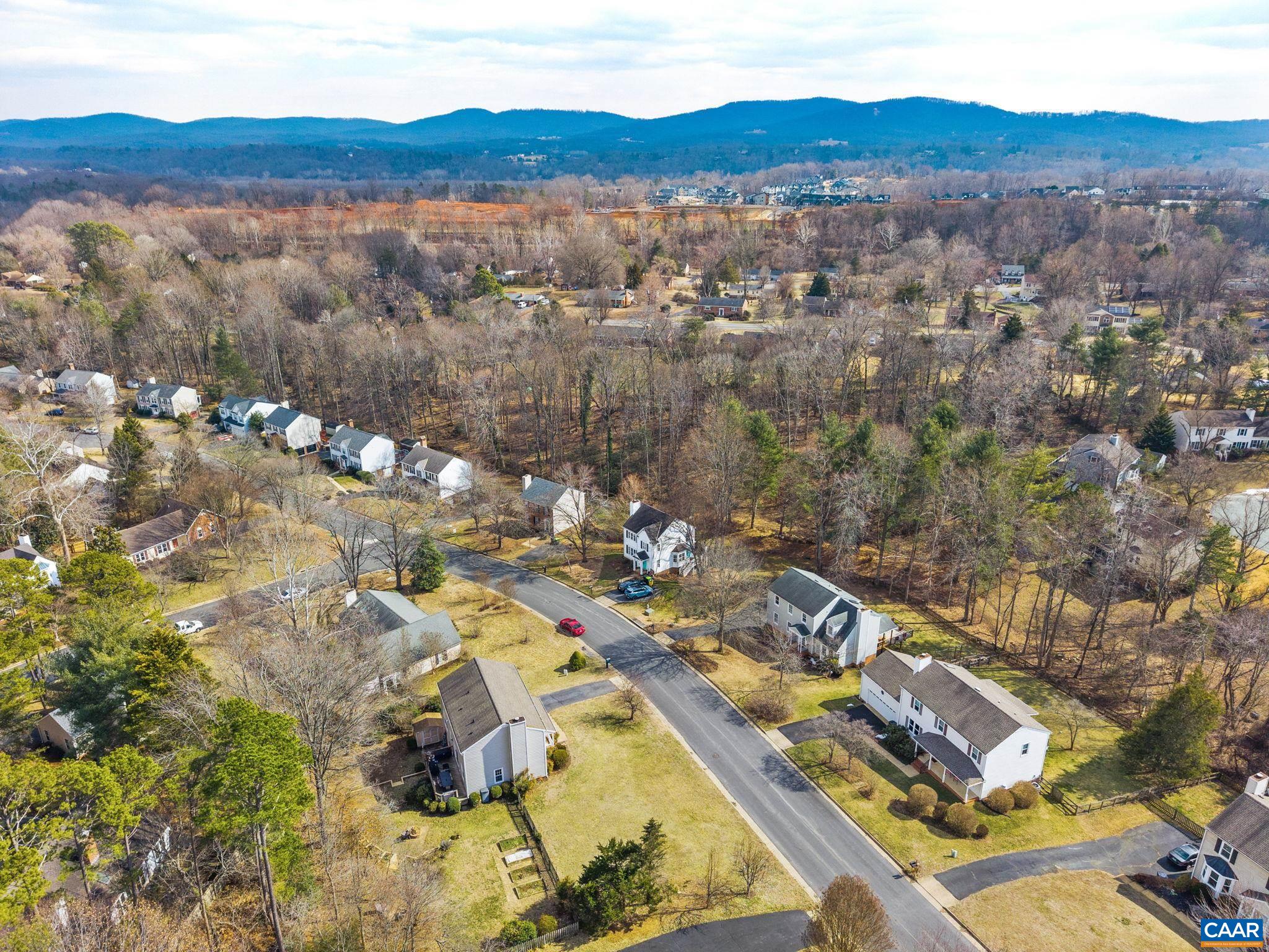 1143 Raintree Drive Charlottesville, VA 22901 - Photo 48 of 49 a view of a city with mountains in the background