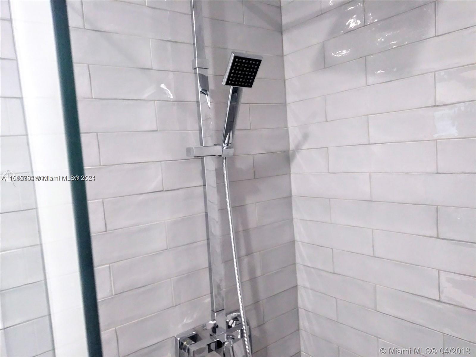 610 Southwest 25th Road Miami, FL 33129 - Photo 15 of 30 a bathroom with a shower