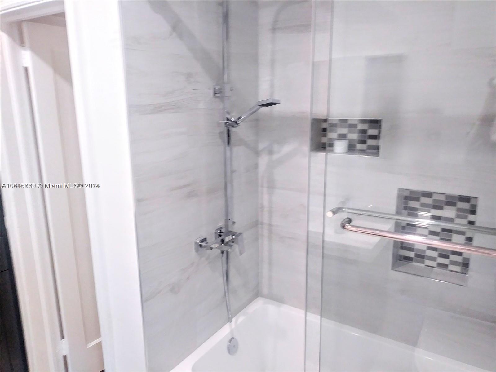 610 Southwest 25th Road Miami, FL 33129 - Photo 19 of 30 a bathroom with a shower