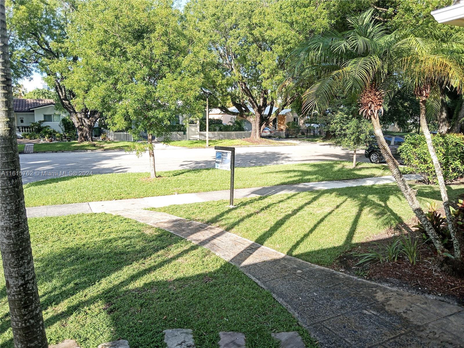 610 Southwest 25th Road Miami, FL 33129 - Photo 23 of 30 a view of yard with swimming pool
