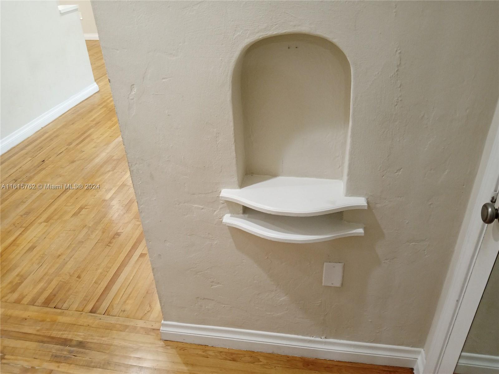 610 Southwest 25th Road Miami, FL 33129 - Photo 26 of 30 a bathroom with a sink and a mirror