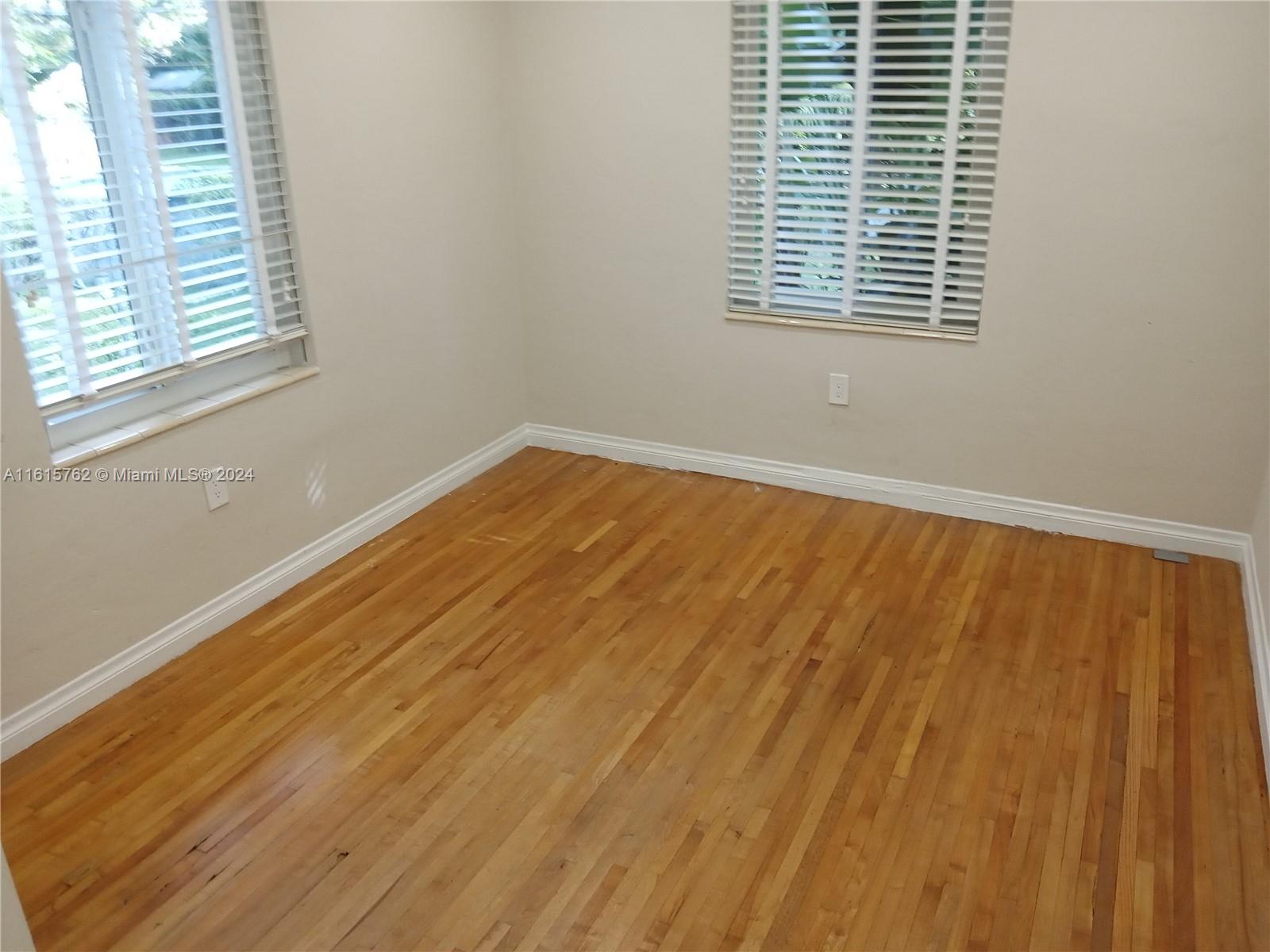 610 Southwest 25th Road Miami, FL 33129 - Photo 28 of 30 a view of an empty room with a window