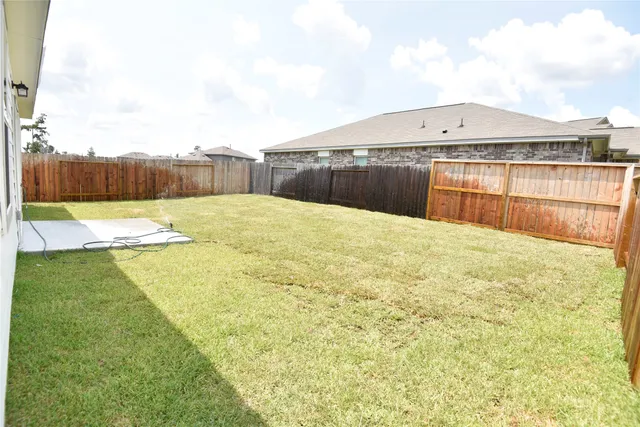 a swimming pool with an outdoor seating