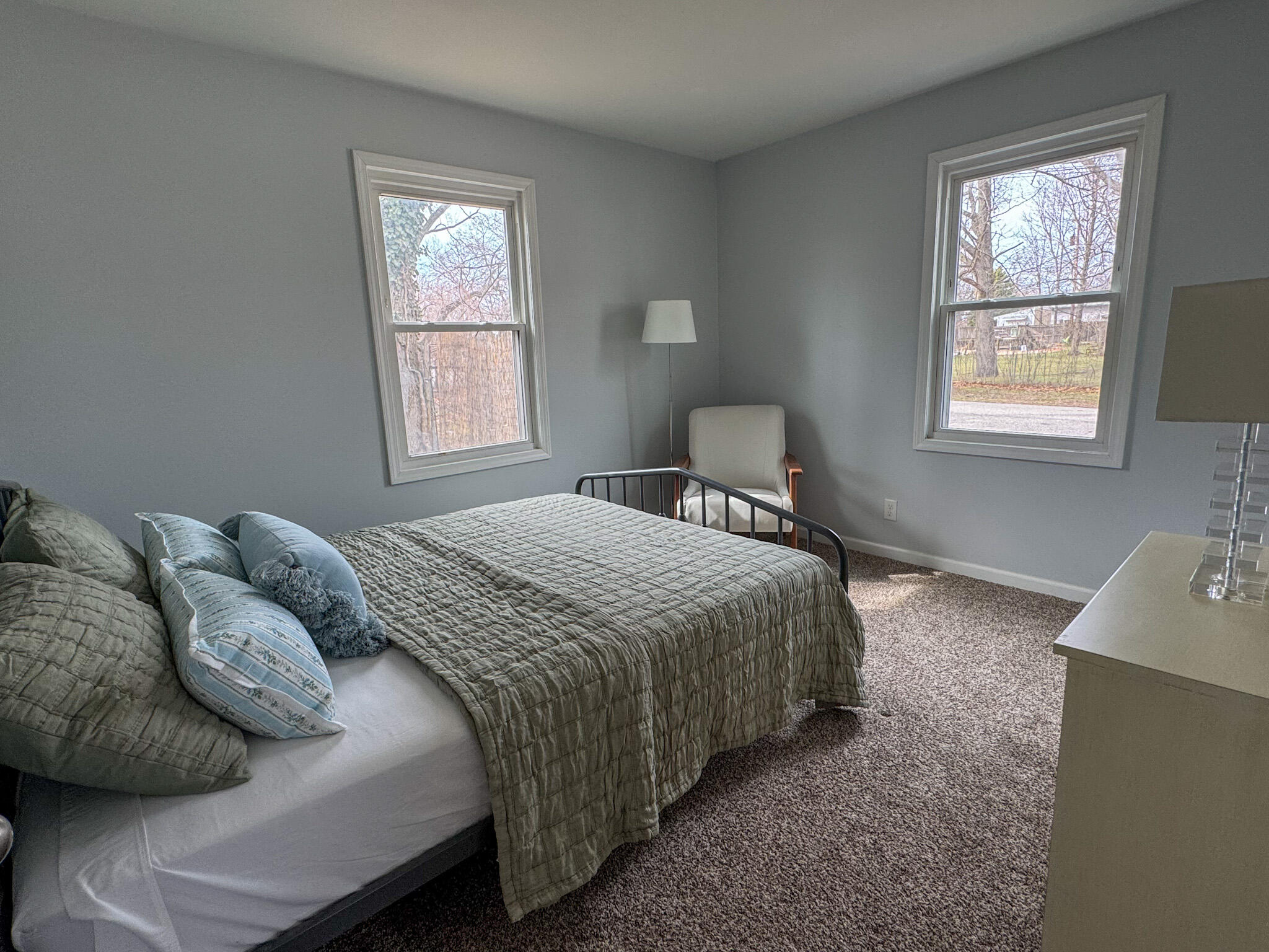 217 Loran Road Michigan City, IN 46360 - Photo 17 of 26 a bedroom with a bed and a window