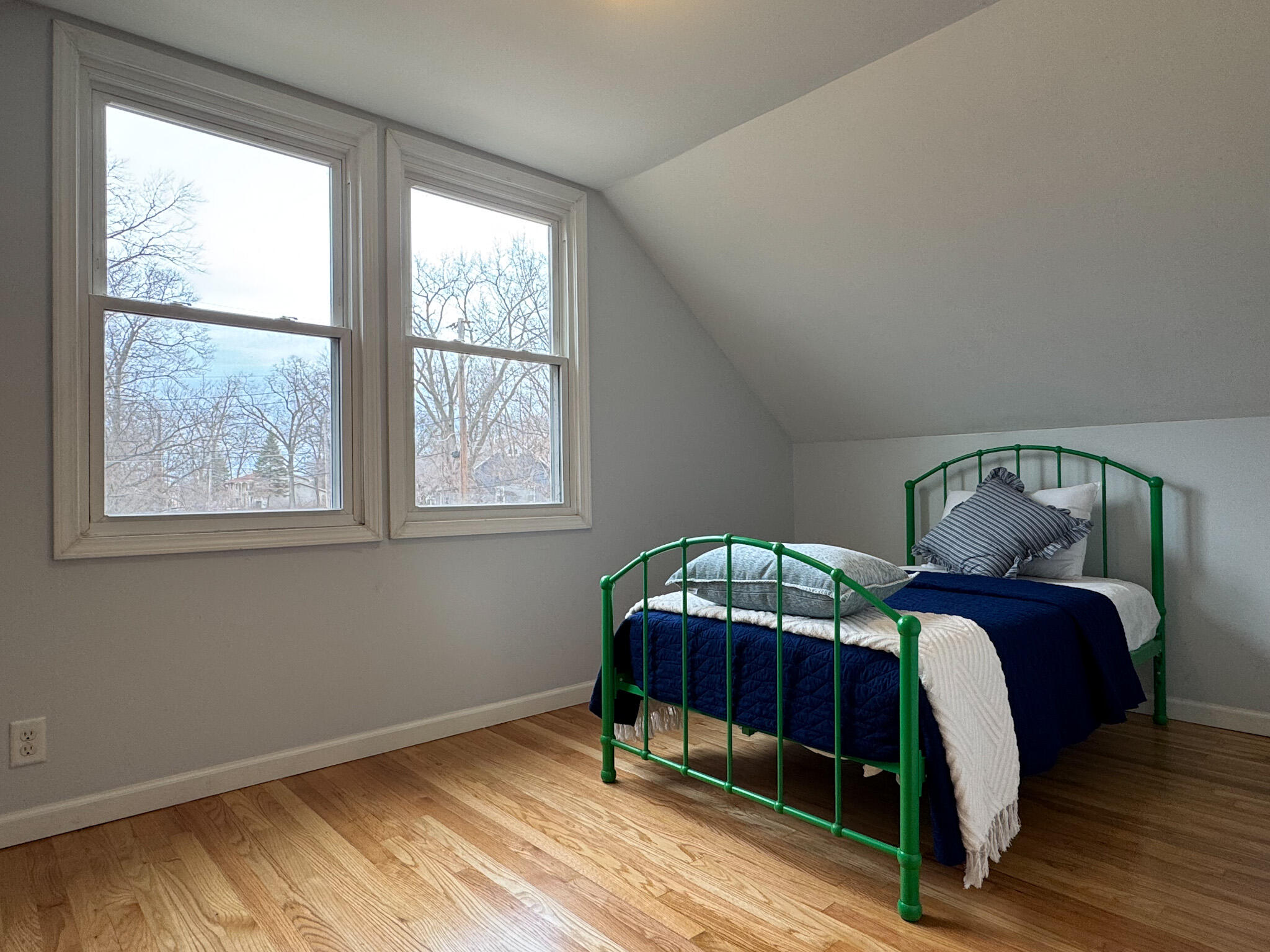 217 Loran Road Michigan City, IN 46360 - Photo 23 of 26 a bedroom with a bed and window