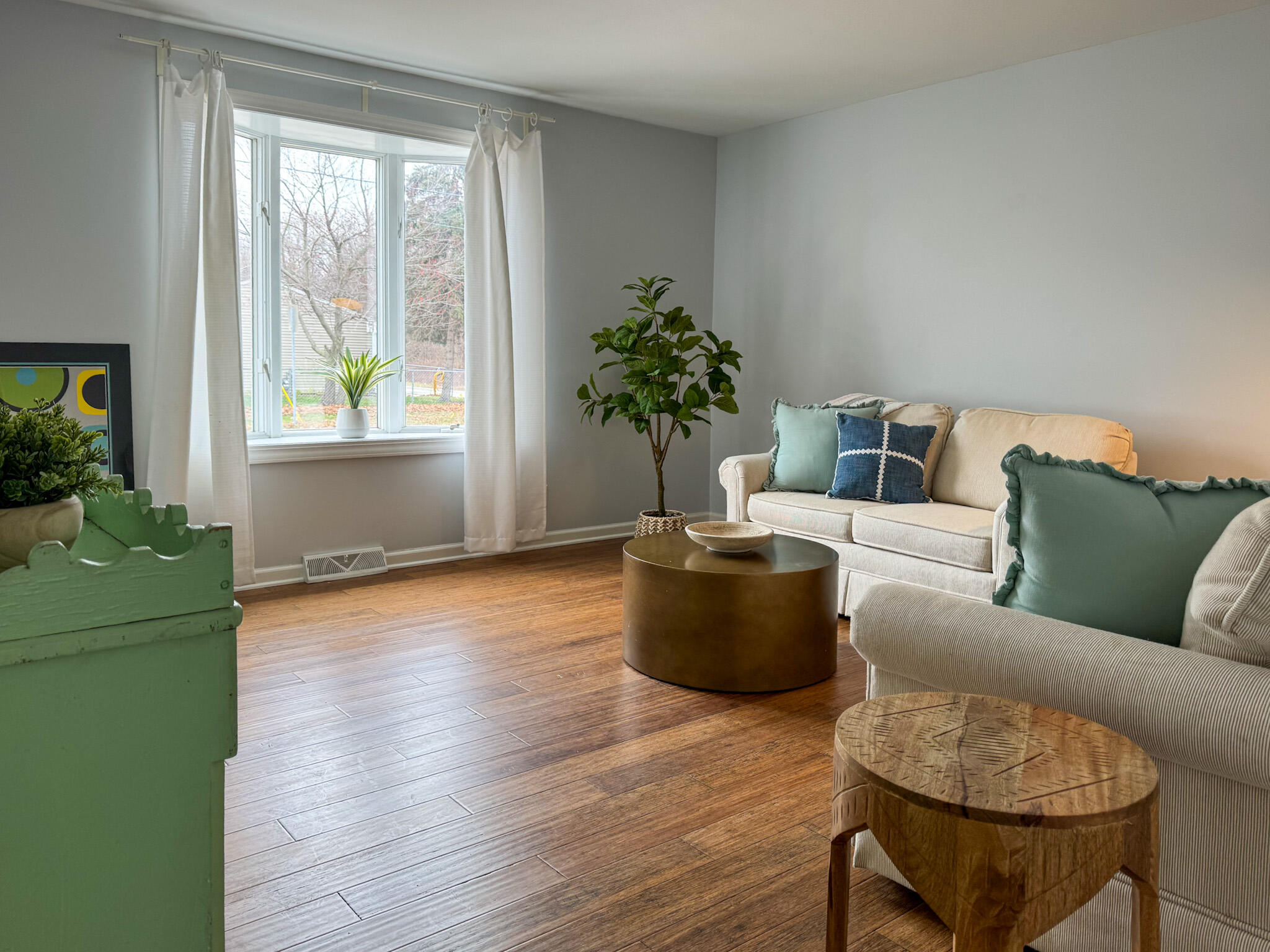 217 Loran Road Michigan City, IN 46360 - Photo 4 of 26 a living room with furniture and a potted plant