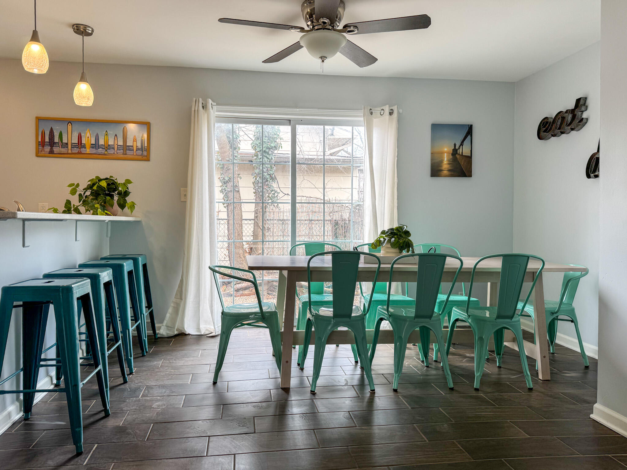 217 Loran Road Michigan City, IN 46360 - Photo 6 of 26 a view of a dining room with furniture window and wooden floor