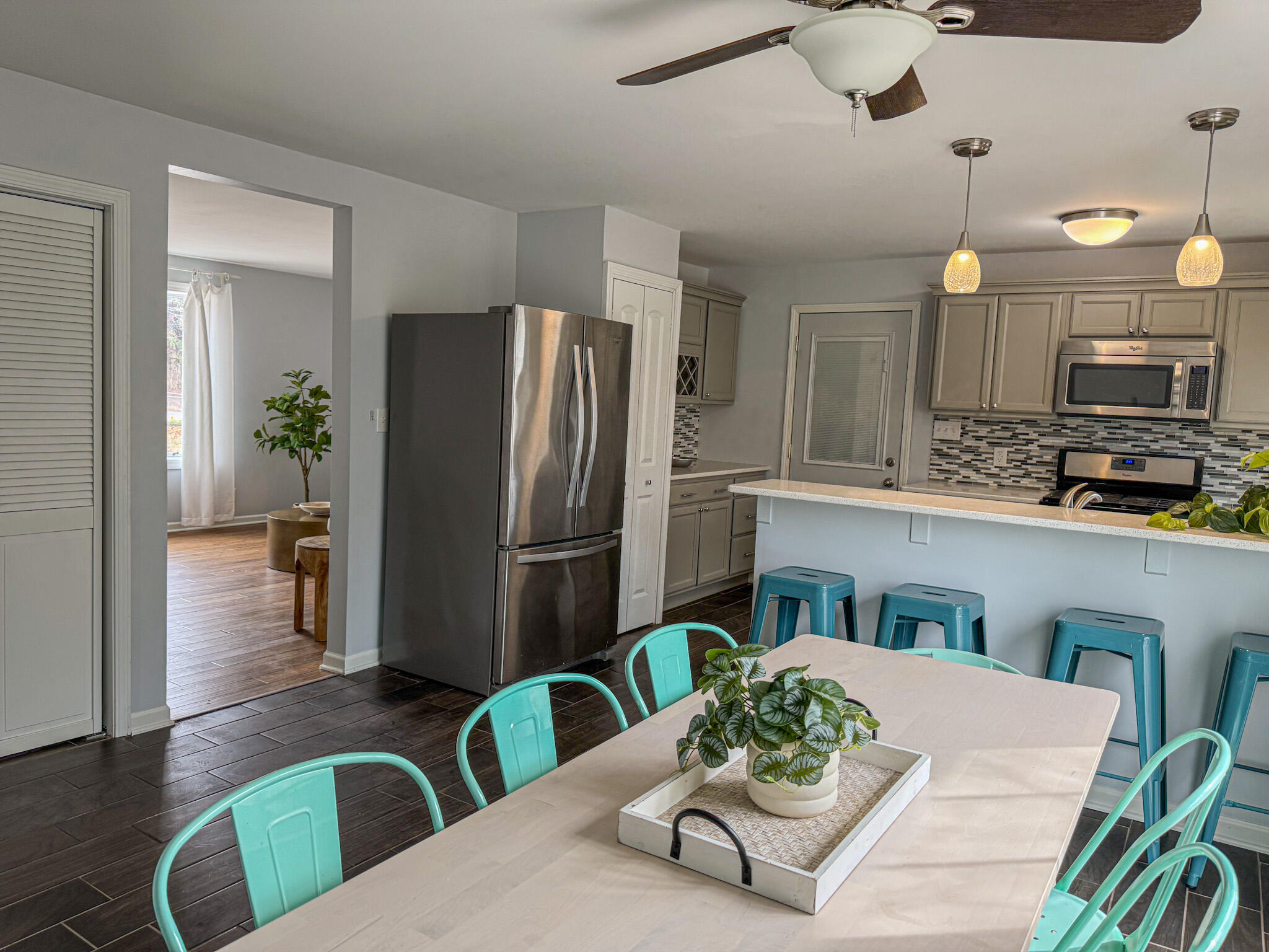 217 Loran Road Michigan City, IN 46360 - Photo 9 of 26 a kitchen with stainless steel appliances granite countertop a dining table and chairs