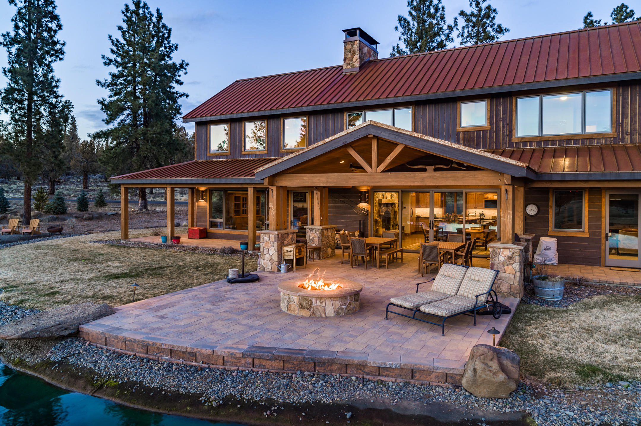 69580 Goodrich Road Sisters, OR 97759 - Photo 4 of 38 Natural stone gas fire pit for cozy evenings