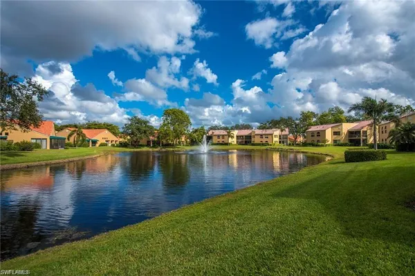 a view of a lake with houses