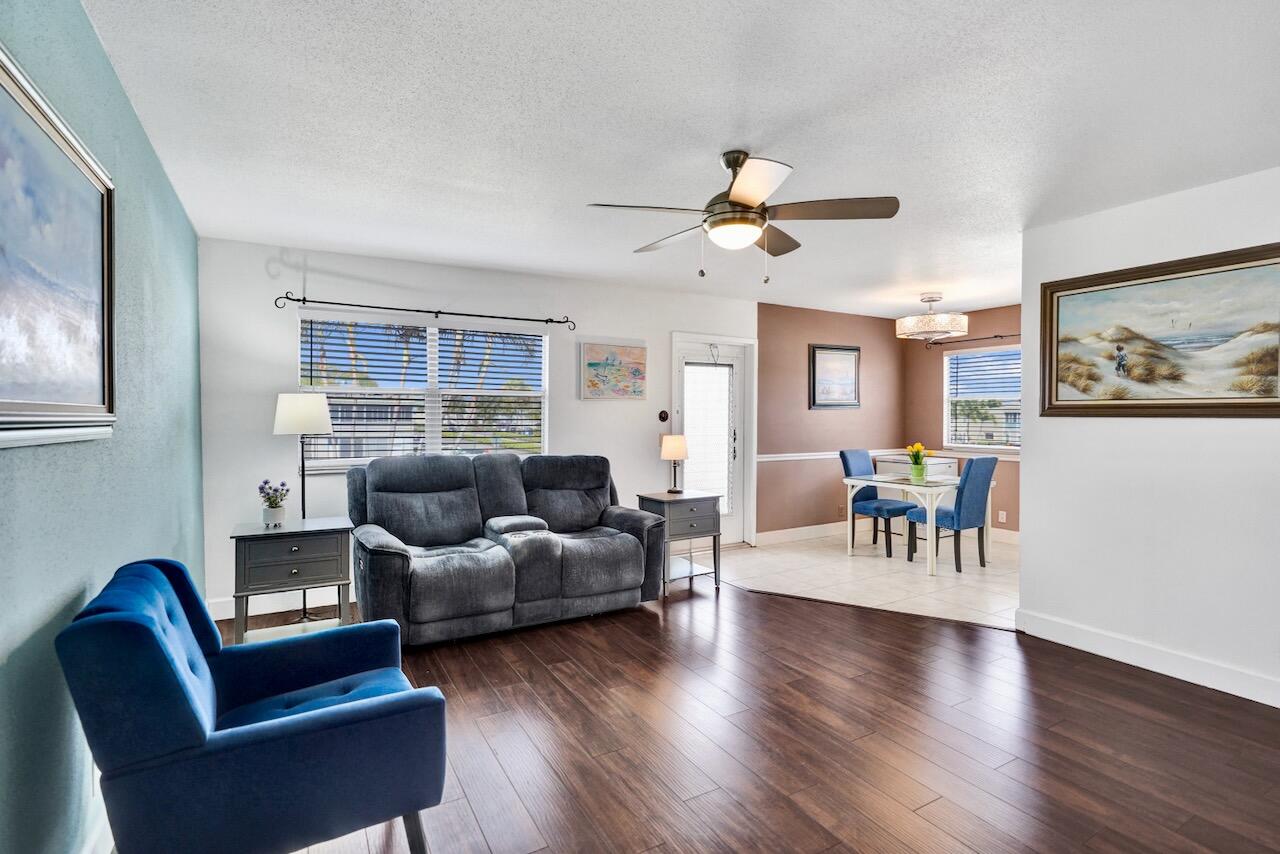 505 Monaco Way Delray Beach, FL 33446 - Photo 11 of 58 a living room with furniture and a large window