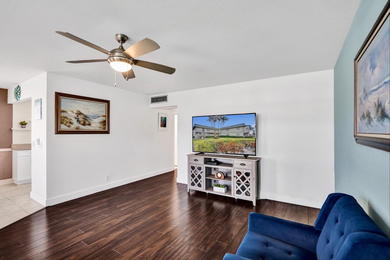 505 Monaco Way Delray Beach, FL 33446 - Photo 12 of 58 a view of a livingroom with furniture and wooden floor